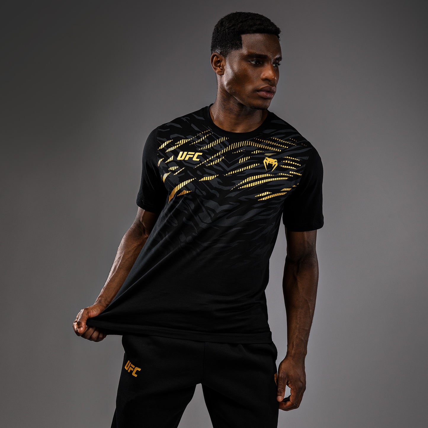 UFC Fusion by Venum Men’s Replica Short Sleeve T-Shirt - Champion