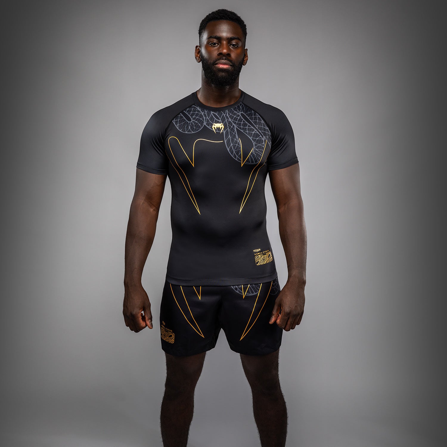 Venum Serpenti Short Sleeve Rashguard - Black/Silver/Gold - Venum