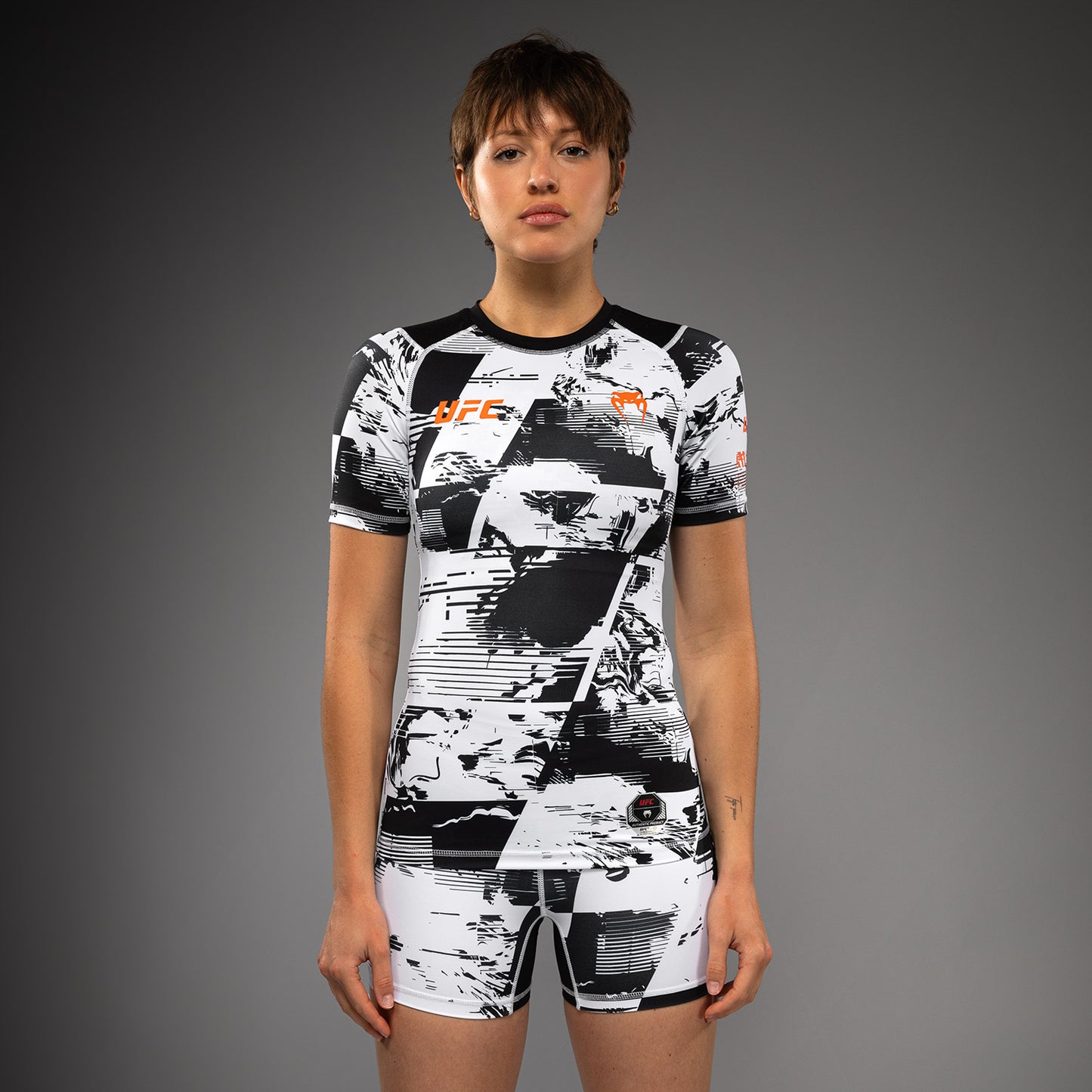 Women’s UFC Zenith by Venum White Authentic Fight Week Performance Short Sleeve Rashguard