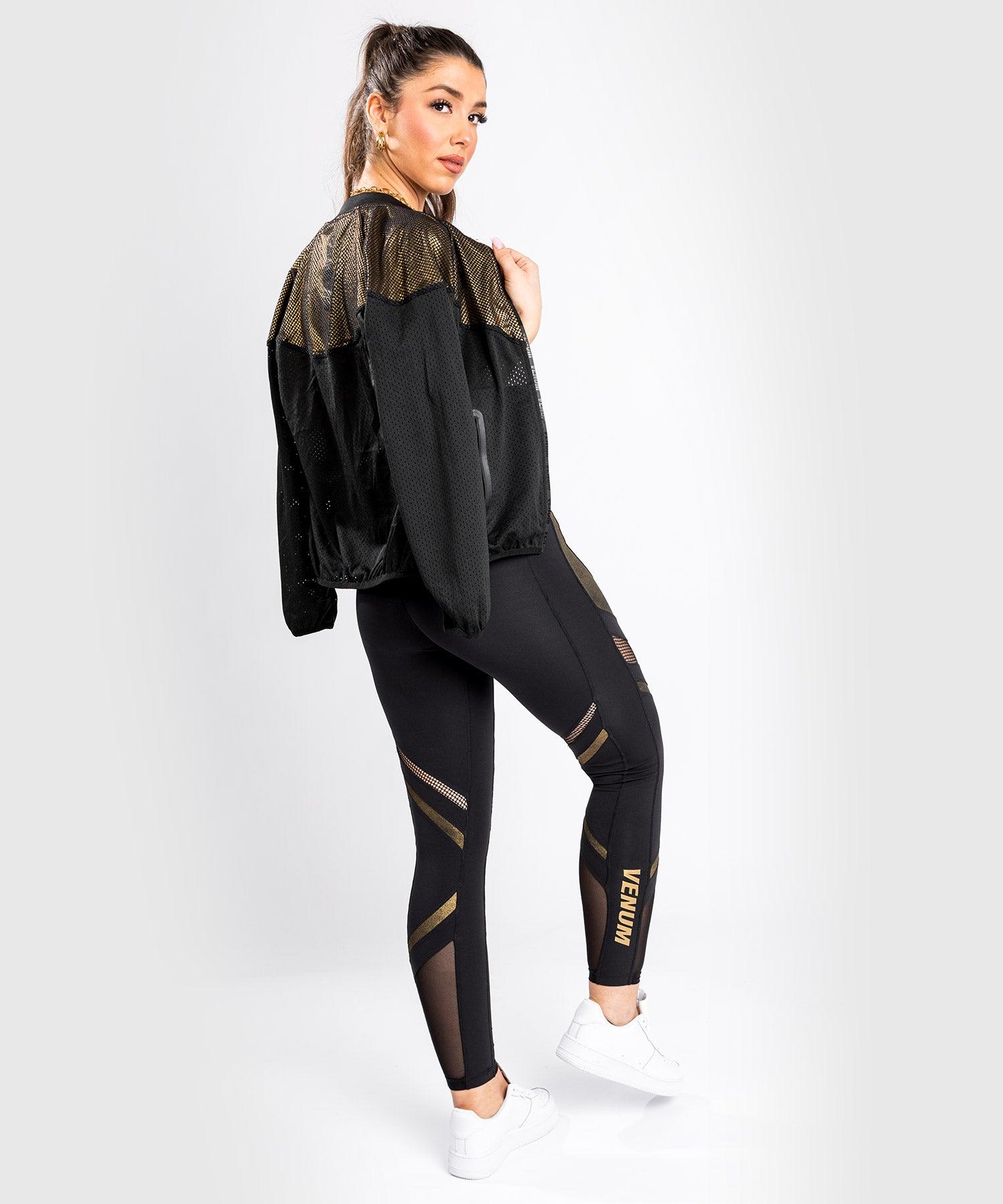 Black leggings with gold zipper deals