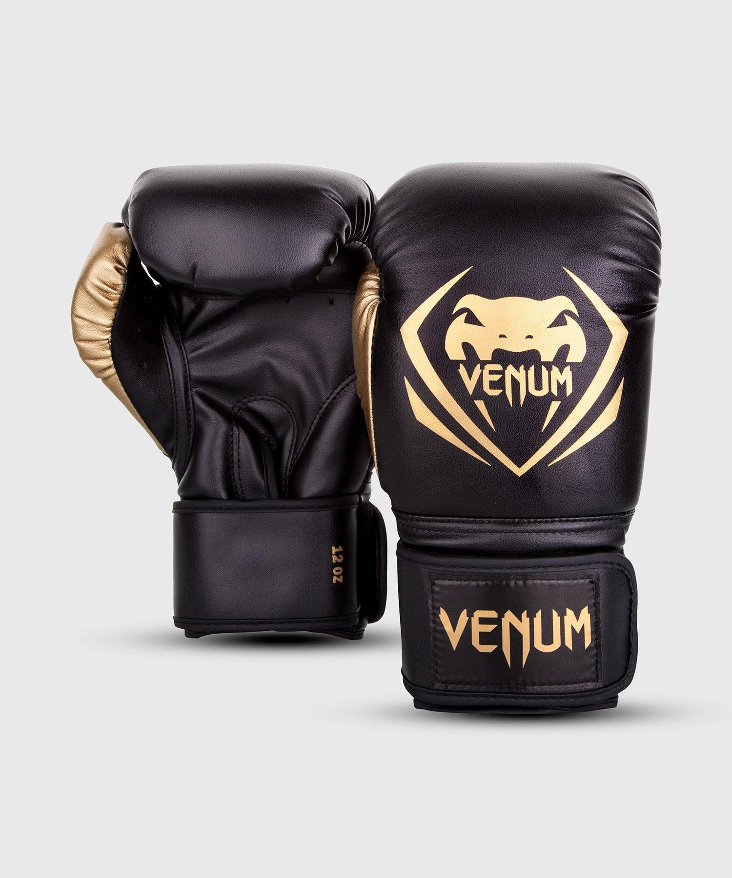 Venum boxing gloves black and gold top