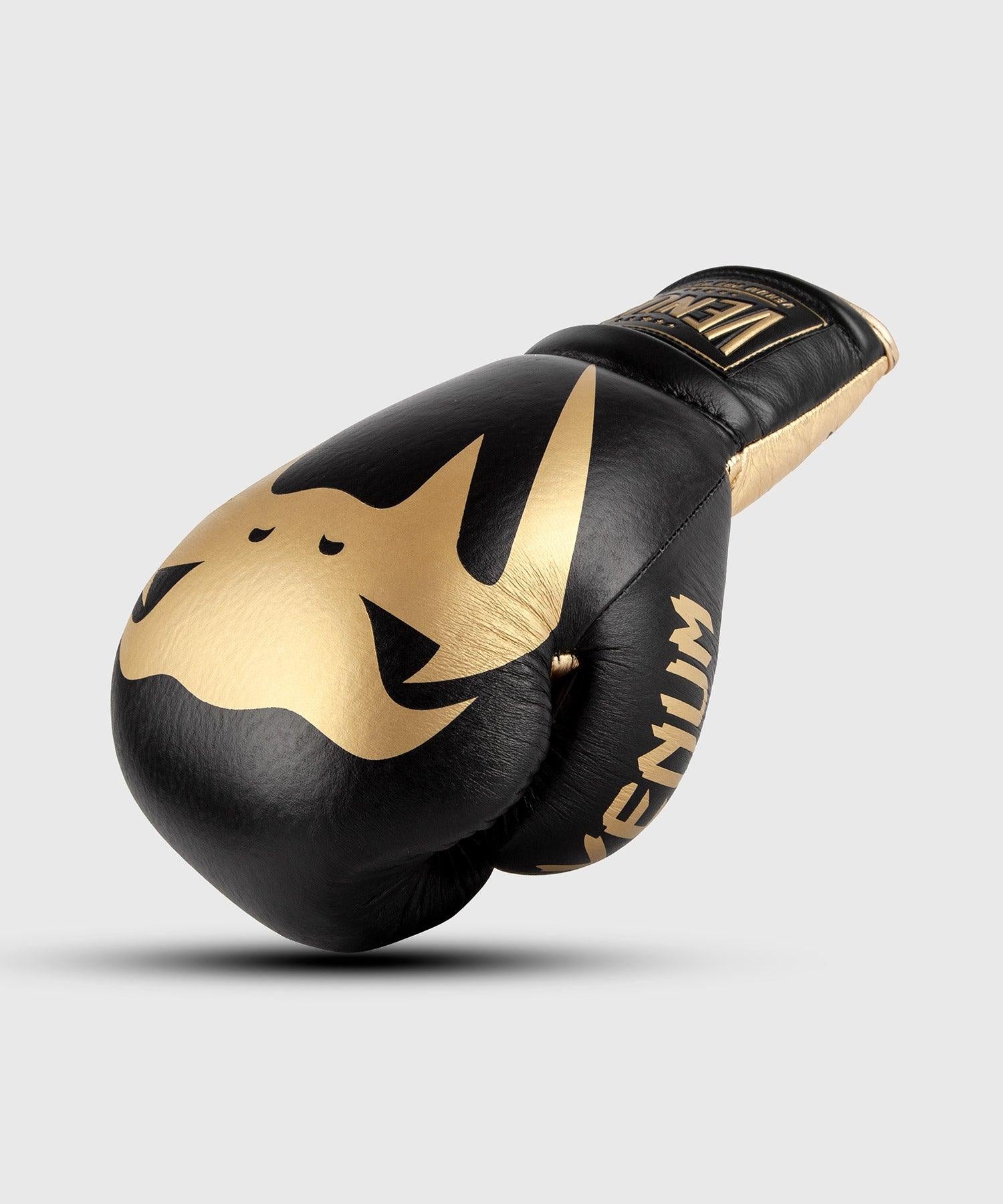 Venum Giant 2.0 Pro Boxing Gloves - With Laces - Black/Gold Picture 1